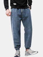 Pantalon en denim délavé à la cheville élastique à rayures latérales pour hommes avec poche