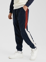 Pantalon en velours côtelé contrasté à rayures latérales avec poches pour pieds avec cordon de serrage pour hommes