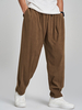 Pantalon en velours côtelé de couleur unie plissé pour homme avec cordon de serrage