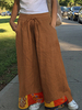 Pantalon ethnique à jambe large et taille haute élastique pour femme avec poche
