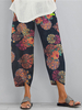 Pantalon fleuri à poche et ourlet tulipe pour femme
