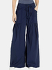 Pantalon large à jambe large et taille élastique de couleur unie pour femmes avec poche