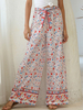Pantalon large bohème taille haute noué imprimé floral vacances ethnique