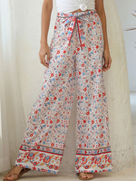 Pantalon large bohème taille haute noué imprimé floral vacances ethnique