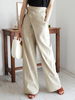 Pantalon large respirant de conception de bandage asymétrique de couleur unie de femmes