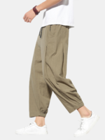 Pantalon sarouel à la taille élastique décontracté en coton pour homme de couleur unie