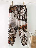 Pantalon sarouel à taille élastique avec poche à cordon imprimé graffiti ethnique pour femme