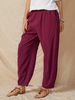 Pantalon sarouel décontracté en coton à poche latérale de couleur unie de taille élastique pour les femmes