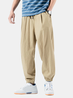 Pantalon sarouel en coton pour homme de couleur unie décontracté lâche élastique à la taille