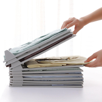 Pliez le conseil dadministration de classeur de système dorganisation de vêtements dorganisateur pour le