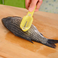 Qualité alimentaire ABS Échelle à poisson Grattoir Détartreur de poisson Échelles de peau Couvercle innovant Design Outi