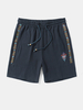 Short à cordon ample en coton brodé à motif géométrique ethnique pour hommes