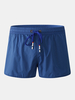 Short de plage décontracté à séchage rapide pour hommes de couleur unie avec doublure de compression