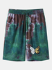 Short taille élastique à imprimé papillon tie-dye pour homme