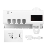 Support de désinfectant de brosse à dents de lampe UV distributeur automatique de presse-dentifrice