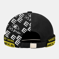 Unisexe Coton Lettre Imprimer Épissage Personnalité De La Mode Brimless Beanie Landlord Cap Skull Cap