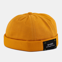 Unisexe Coton Lettre Patch Hip-Hop Casual Parasol Chapeau Brimless Beanie Landlord Cap Skull Cap
