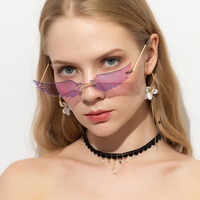 Unisexe Peisonality Cat Eye Shape Frameless Fashion UV Lunettes de soleil de protection