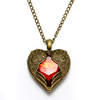 Bronze Peacock Heart Cross Pendant Sweater Necklace