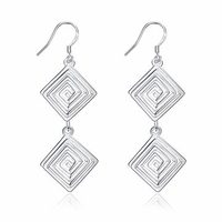 YUEYIN® Hollow Spiral Pattern Simple Tassel Silver Plated Earrings