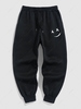 Pantalon de Jogging Chaud Motif de Visage Souriant en Laine M Noir