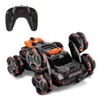 2.4GHz 4WD télécommande RC cascadeur voiture Double face 360 ° véhicules rotatifs avec lumière de musique de pulvérisation