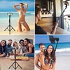 Andoer 157cm / 61.8in Smartphone Selfie Stick Trépied Trépied de bureau extensible Support de photographie Support de photographie avec clip de téléphone Obturateur à distance sans fil pour Vlog Selfie Live Streaming Video Recording