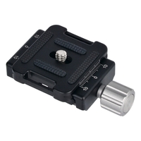 Andoer DC-34 Adaptateur de serrage à plaque à dégagement rapide avec une plaque à dégagement rapide Vis 1/4 "pour tête de trépied AS Standard Arca-Swiss