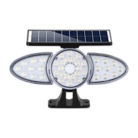 Applique murale solaire à trois têtes Lampe de détection de corps humain LED imperméable à l