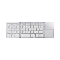 Clavier BT sans fil Mini clavier pliant Portable Ultra mince clavier BT avec pavé tactile pour Windows/Android/iOS argent