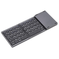 Clavier KKmoon Portable Mini Ultra Slim mince pliable BT pliable sans fil avec Touchpad pour iPhone 6s / Pro PC / MacBook Mobile Phone Tablet iPad