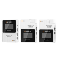 COMICA BoomX-D PRO D2 One-Trigger-Two Système de microphone sans fil double canal 2.4G Carte mémoire 8G intégrée Modes de sortie numériques et analogiques Portée effective de 100 m pour appareils photo reflex numériques sans miroir Smartphones Ordi