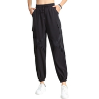 Femmes Baggy Jogger Pants Élastique anti-humidité Séchage rapide Bretelles croisées Poche Harem Pantalon cargo Yoga Course à pied Pantalon de sport