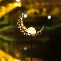 Lampe à gazon à motif évidé de lune à panneau solaire Lampe extérieure en acier inoxydable