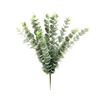 Le feuillage artificiel naturel de branches artificielles de Noël laisse la fleur