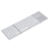 Mini clavier sans fil BT pliable ultra mince et mince portable avec pavé tactile pour téléphone portable PC