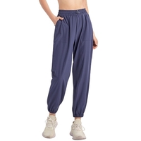 Pantalon de sport pour femme couleur unie élastique taille haute avec cordon de serrage poche lâche respirant course Yoga pantalon de gymnastique