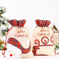 Sac cadeau de bonbons de Noël avec cordon de serrage Motif Père Noël Sac fourre-tout cadeau réutilisable Chaussettes suspendues heureuses pour les décorations de vacances et de Noël