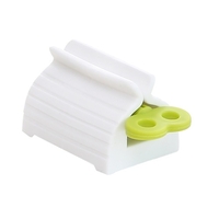 Siège de dentifrice vertical pour presse-dentifrice à tube roulant