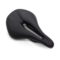 Siège de vélo selle de vélo en fibre de carbone confortable VTT coussin de siège de vélo de route conception creuse absorbant les chocs avec remplissage EVA pour hommes et femmes