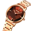 SKMEI 1789 Montre-bracelet pour femmes élégantes et élégantes avec bracelet en acier inoxydable / Miroir 3D 30M Montre analogique à quartz étanche Mode Simple Bracelet pour dames