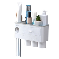 Support de brosse à dents avec distributeur de dentifrice Presse-agrumes Tiroir de tasse de brosse à dents magnétique
