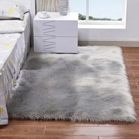 Tapis moelleux en laine de peau de mouton de forme rectangulaire avec une peluche ultra douce