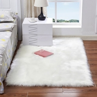 Tapis moelleux en laine de peau de mouton de forme rectangulaire avec une peluche ultra douce