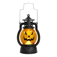 Veilleuse de conception de citrouille à LED à côté de la lampe à piles à piles