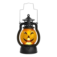 Veilleuse de conception de citrouille à LED à côté de la lampe à piles à piles
