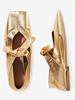 Ballerines dorées à bout carré et détails noués métalliques