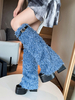 Bottes hauteur genou noires avec boucle à plateforme et détails en fausse fourrure