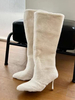 Bottes mi-mollet blanches en fausse fourrure d