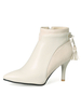 Bottine femme à bout pointu et talons aigus en micro daim unicolore avec frange Boots